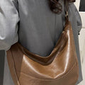 Clementine Sleek Sling Táska